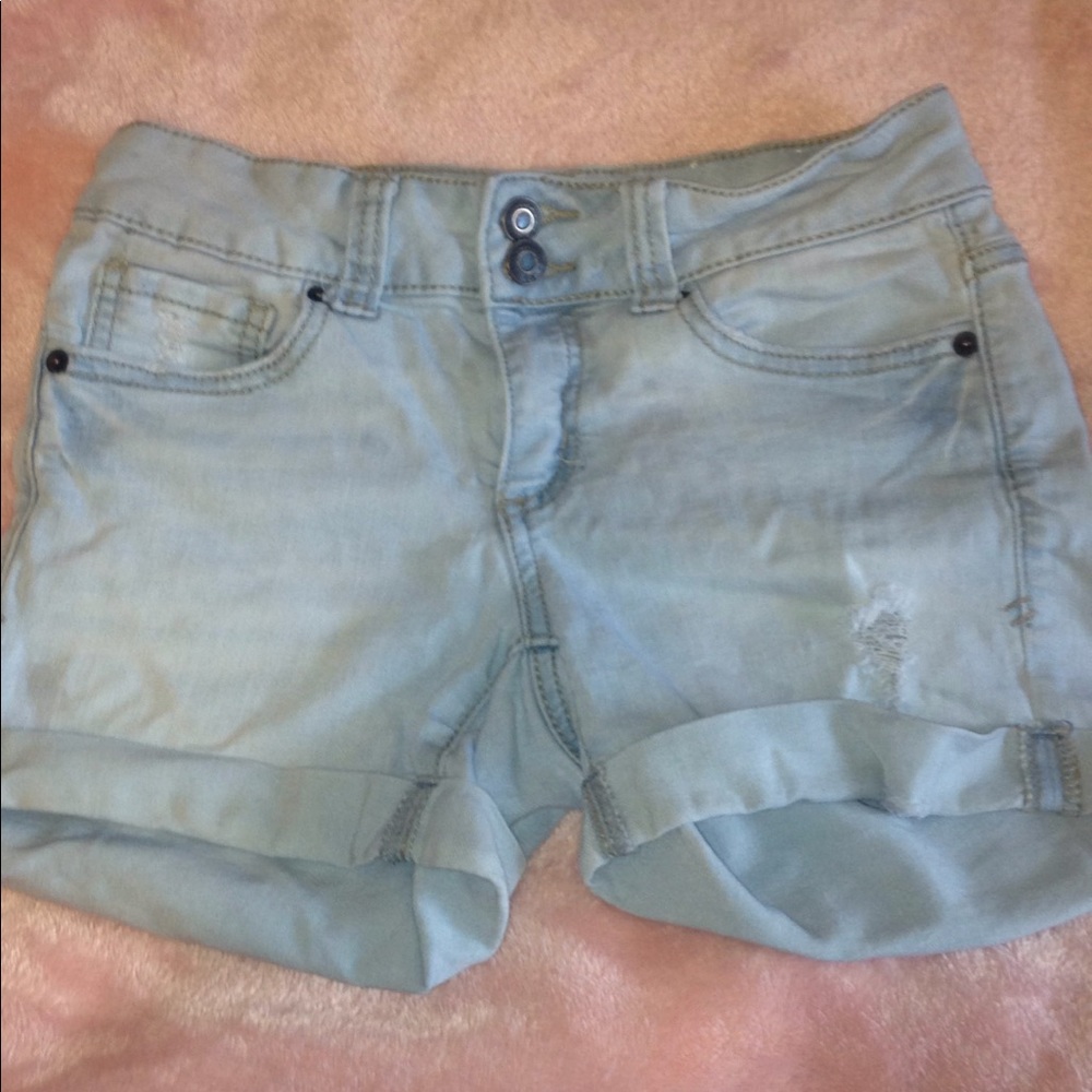 Light wash denim shorts.